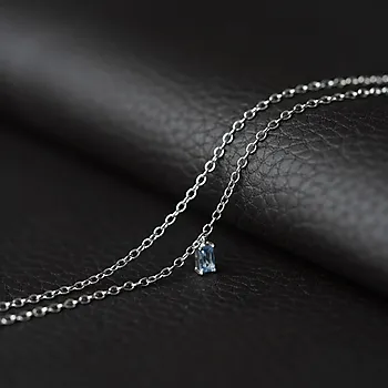 Bilde nummer 4 av Ankelkjede i sølv med blå zirkonia 25 cm - Rhodinert L:22+3 cm H:5 mm B:3 mm