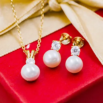 Bilde nummer 2 av Smykkesett i 925 forgylt sølv med perlemor