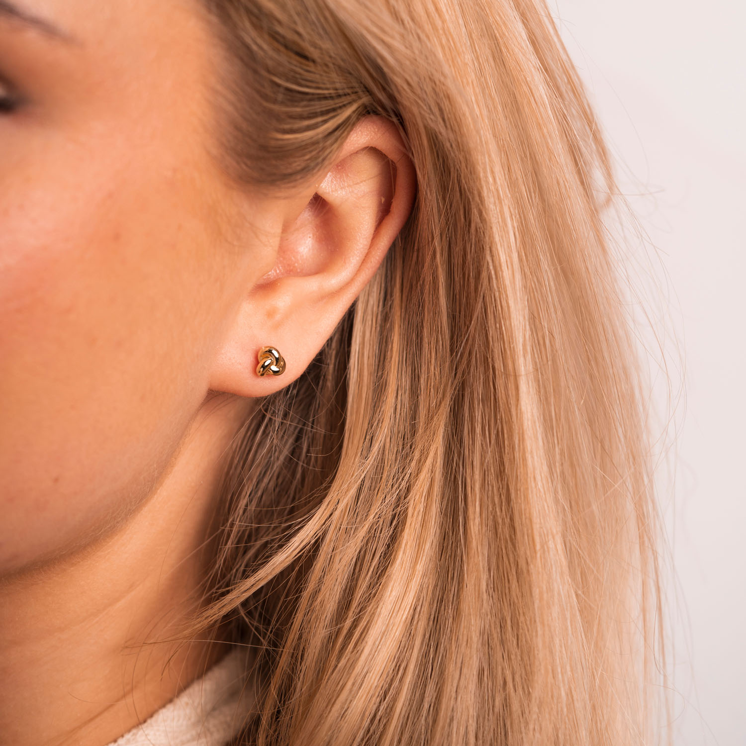 Bilde nummer 4 av Pan Jewelry, Smykkesett med øredobber og armbånd i forgylt 925 sølv med knute