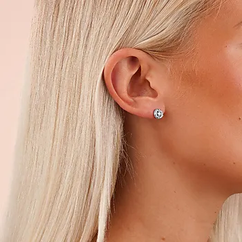 Bilde nummer 2 av Twist øredobber i messing med zirkonia