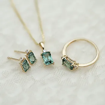 Bilde nummer 4 av Pan Jewelry, Ring i 585 gult gull med zirkonia og syntetisk grønn spinell