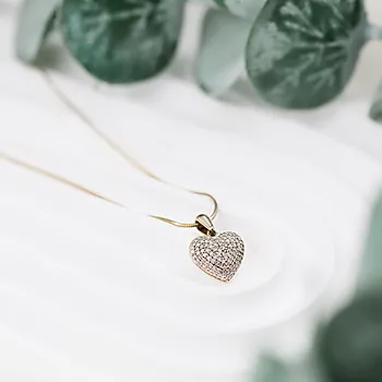 Bilde nummer 3 av Clara smykke i 375 gult gull med diamanter 0,25 ct
