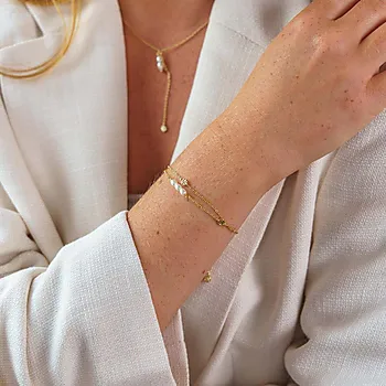 Bilde nummer 2 av Soft armbånd i 925 forgylt sølv med skjellperler