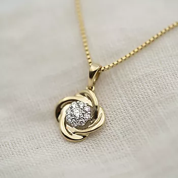 Bilde nummer 2 av Pan Jewelry, Anheng i 585 gult gull med diamanter og blomst 0,25 ct