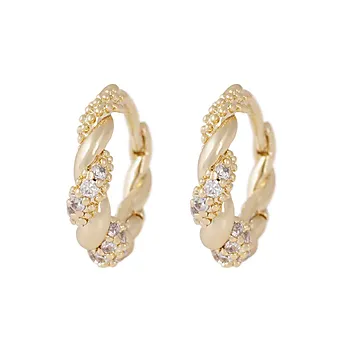 Twist øreringer i forgylt messing med zirkonia