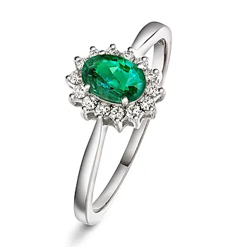 Diamantring i 585 hvitt gull 0,14 ct med smaragd