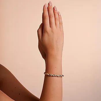 Bilde nummer 2 av Twist armbånd i forgylt messing med zirkonia