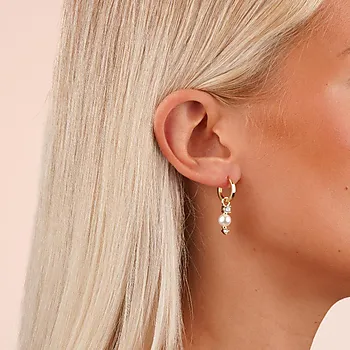 Bilde nummer 2 av Eira øreringer i forgylt messing med perle