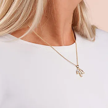 Bilde nummer 2 av Eira smykke i forgylt messing med zirkonia