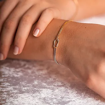 Bilde nummer 2 av Pan Jewelry, Armbånd i forgylt og rhodinert 925 sølv med evighetstegn