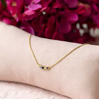 Bilde nummer 3 av Janne Formoe by Pan Jewelry, Smykke i forgylt 925 sølv med blå zirkonia