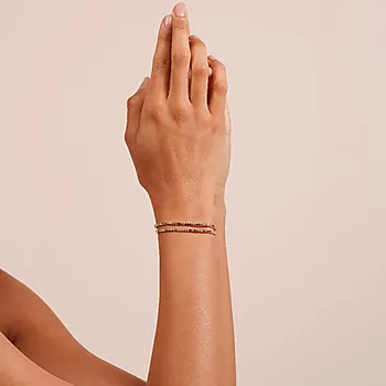 Bilde nummer 2 av Sprinkles armbånd i forgylt messing med rosefargede zirkonia