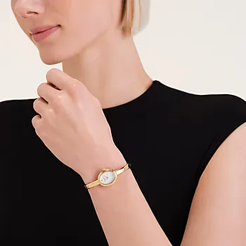 Bilde nummer 2 av Bangle dameklokke i gullfarget stål, small