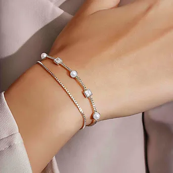 Bilde nummer 3 av Armbånd i 925 sølv med skjellperler