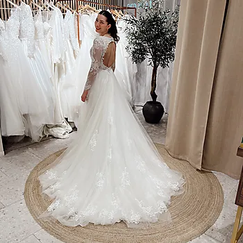 En gang til brudekjole, Justin Alexander