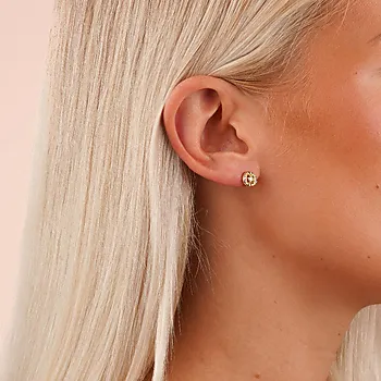 Bilde nummer 2 av Twist øredobber i forgylt messing med zirkonia