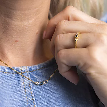 Bilde nummer 2 av Janne Formoe by Pan Jewelry, Smykke i forgylt 925 sølv med blå zirkonia