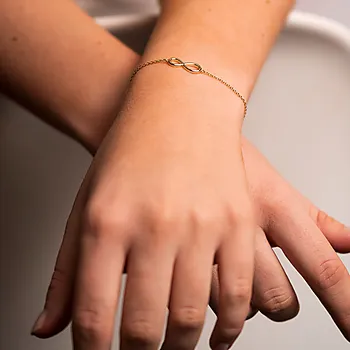 Bilde nummer 3 av Pan Jewelry, armbånd i 925 forgylt sølv med evighetstegn
