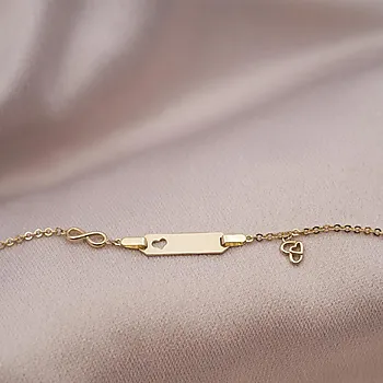 Bilde nummer 2 av Armbånd til barn i 585 gult gull med graveringsplate