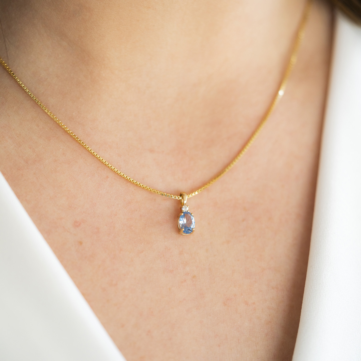 Bilde nummer 2 av Pan Jewelry, Anheng i 585 gult gull med zirkonia og syntetisk blå spinell