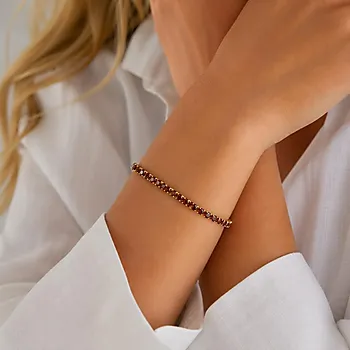 Bilde nummer 2 av Trinity armbånd i forgylt messing med brune zirkonia M/L