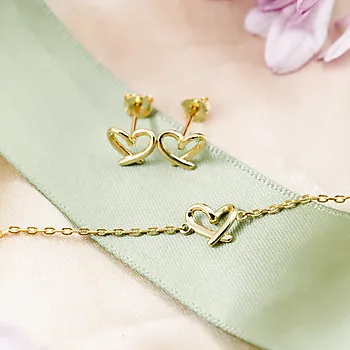 Bilde nummer 2 av Pan Jewelry, Smykkesett med armbånd og øredobber i forgylt 925 sølv med hjerte