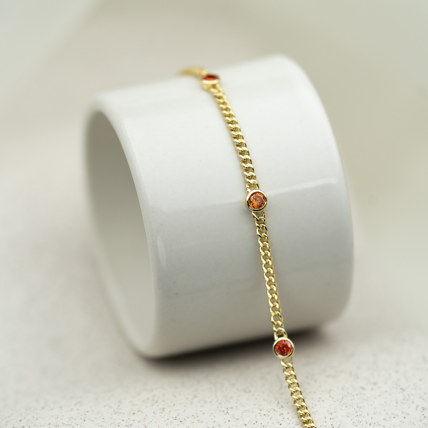Bilde nummer 2 av Pan Jewelry, Armbånd i forgylt 925 sølv med orange zirkonia