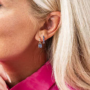 Bilde nummer 2 av Pan Jewelry, Øreringer i forgylt sølv med blå zirkonia