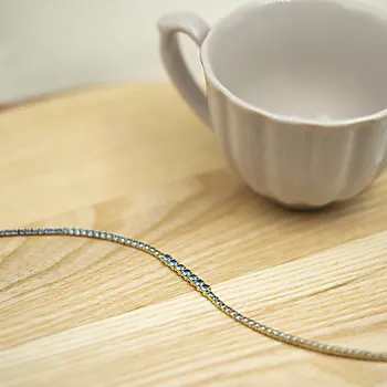 Bilde nummer 3 av Pan Jewelry, Armbånd i forgylt 925 sølv med lyseblå zirkonia