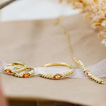 Bilde nummer 4 av Pan Jewelry, Øreringer i forgylt 925 sølv med champagnefarget zirkonia