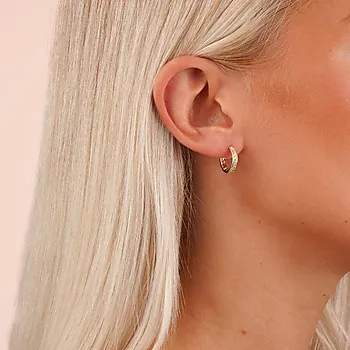 Bilde nummer 2 av Twist øreringer i forgylt messing med zirkonia